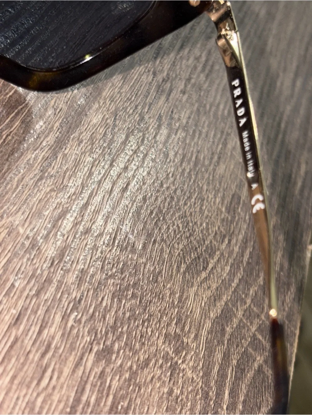 Prada Women’s Black Lensed Sunglasses with Gold Trim Prada Cinema SPR 53S